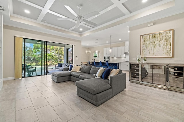 living area with ornamental molding, coffered ceiling, beamed ceiling, and ceiling fan with notable chandelier