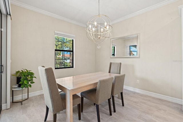 dining space with a chandelier, ornamental molding, and baseboards