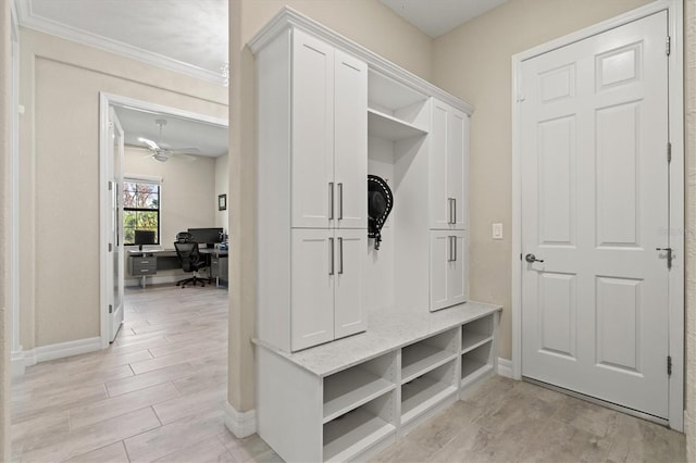 mudroom with baseboards, ornamental molding, a ceiling fan, and wood finish floors