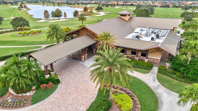 aerial view featuring a water view and golf course view