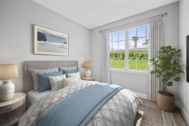 bedroom featuring hardwood / wood-style floors