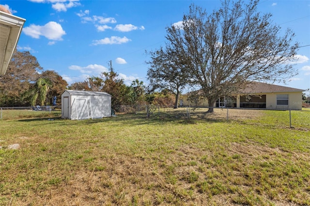 view of yard with a storage shed