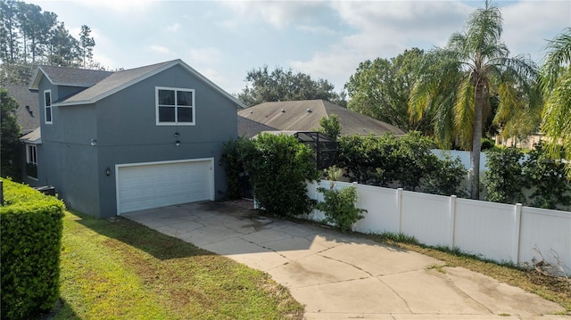 view of home's exterior with a garage