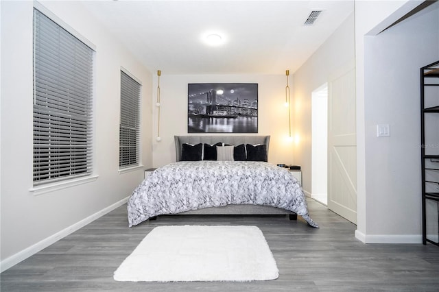 bedroom featuring dark hardwood / wood-style floors