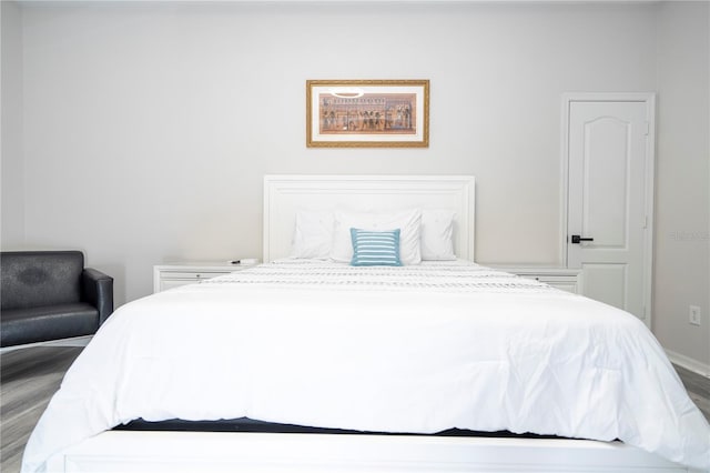 bedroom featuring hardwood / wood-style floors