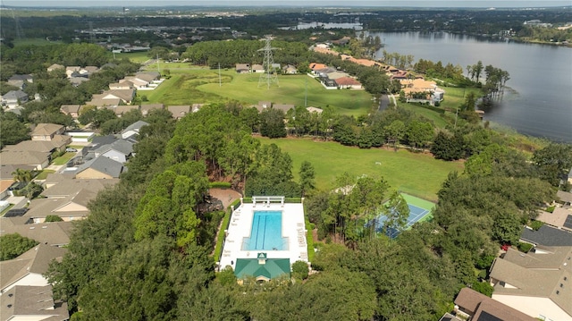 birds eye view of property with a water view and a residential view