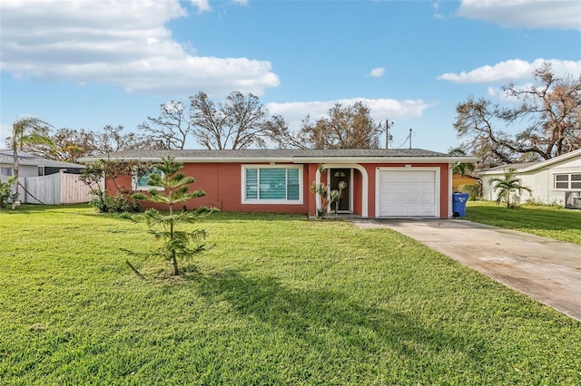 single story home featuring a front yard and a garage