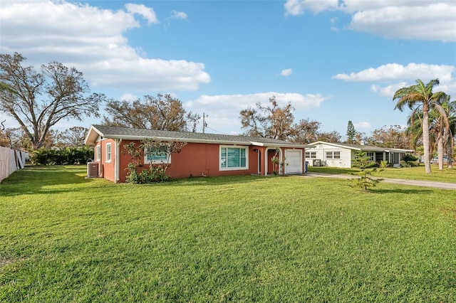 ranch-style house with central AC and a front yard