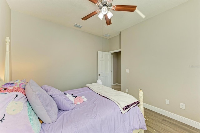 bedroom featuring ceiling fan and light hardwood / wood-style flooring