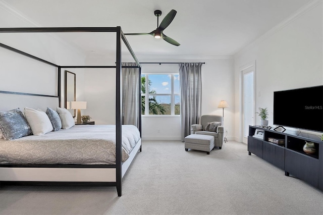 bedroom with crown molding, light carpet, and ceiling fan