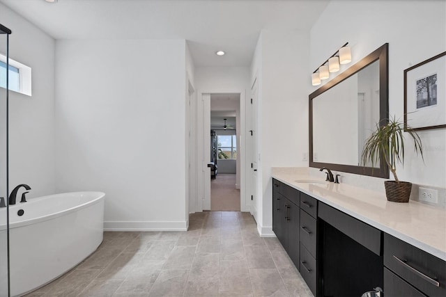 bathroom featuring vanity and a bathing tub