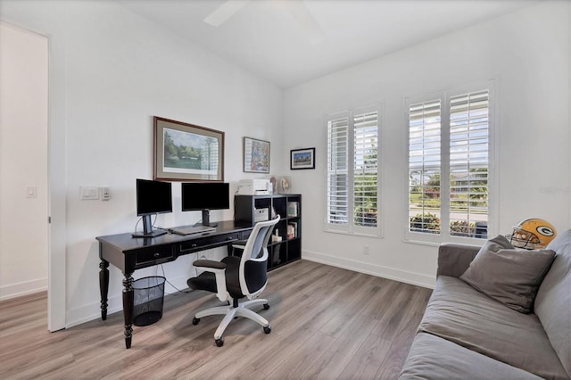 office space with light hardwood / wood-style floors