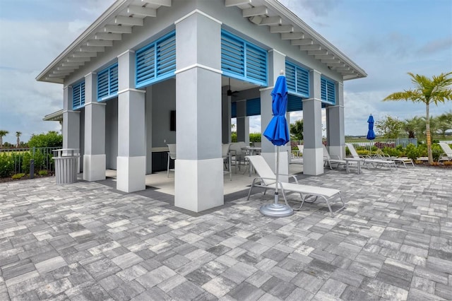 view of patio / terrace featuring ceiling fan