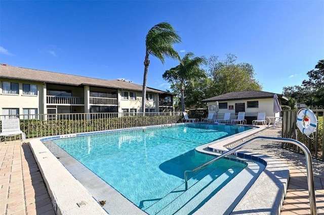 view of swimming pool featuring a patio