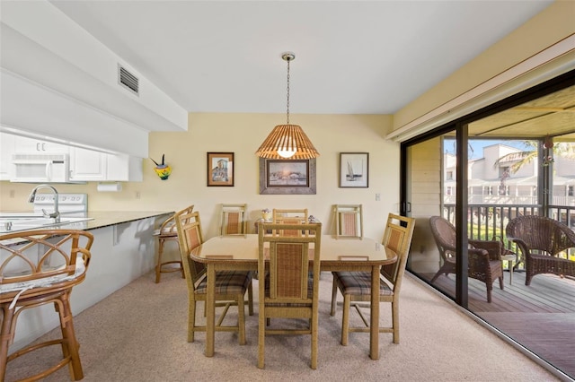 view of carpeted dining room