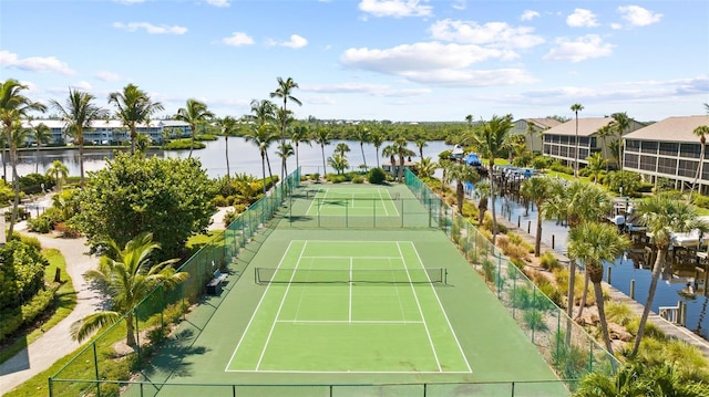 view of sport court with a water view