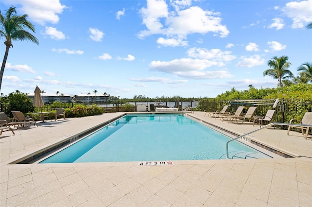 view of pool featuring a patio