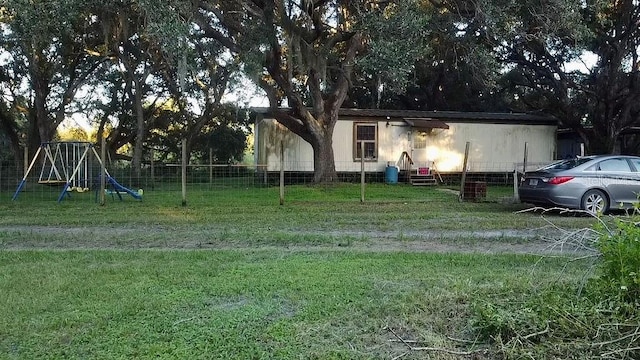 view of yard with a playground