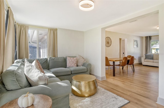 living room featuring light wood-type flooring