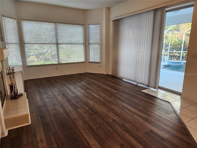 unfurnished room featuring hardwood / wood-style flooring