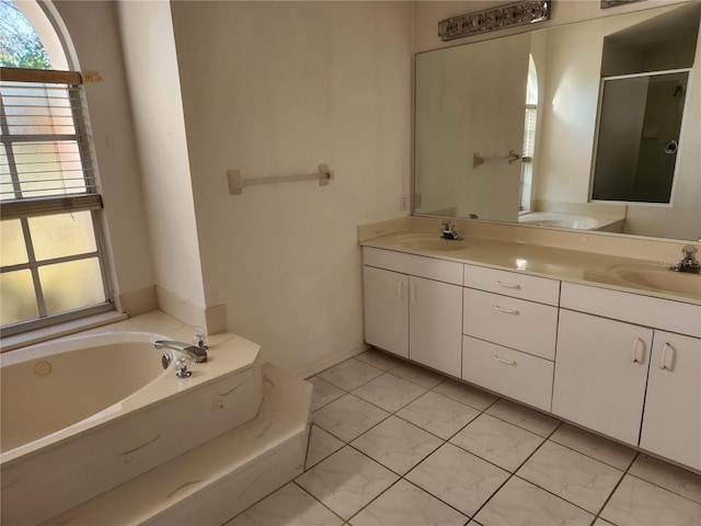 bathroom featuring tile patterned floors, vanity, and plus walk in shower