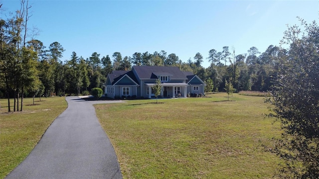 single story home with a front yard