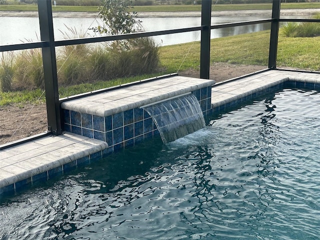 view of pool featuring a water view and pool water feature