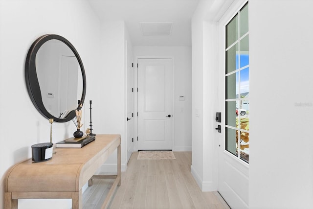 doorway to outside featuring light hardwood / wood-style floors