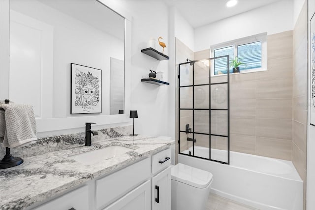 full bathroom with vanity, enclosed tub / shower combo, and toilet