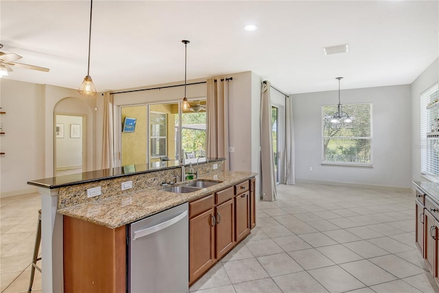 kitchen with dishwasher, sink, and plenty of natural light