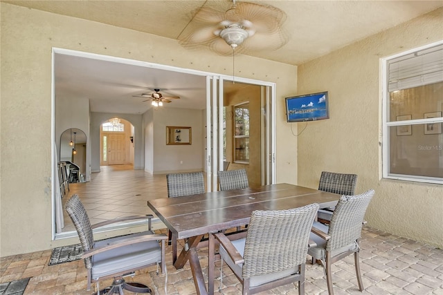 dining area with ceiling fan