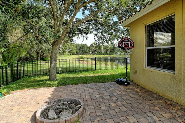 view of patio / terrace with a water view