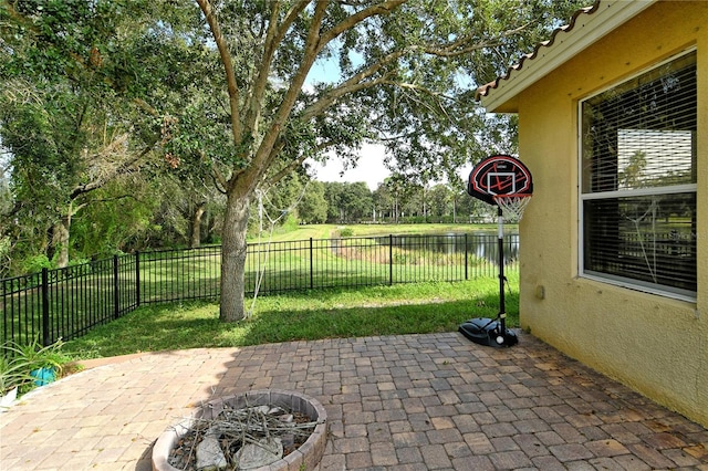 view of patio / terrace featuring a water view