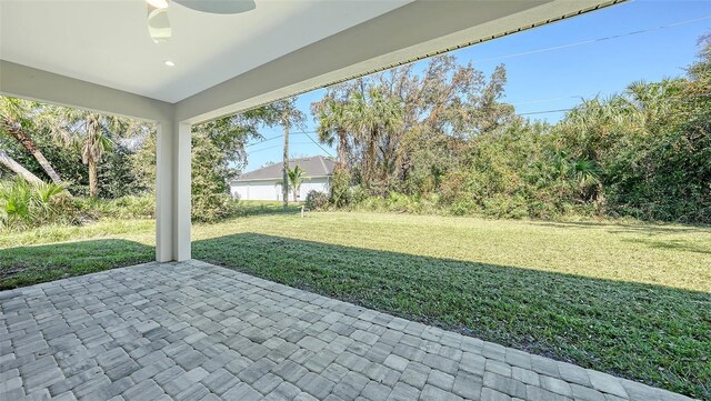 view of yard featuring a patio