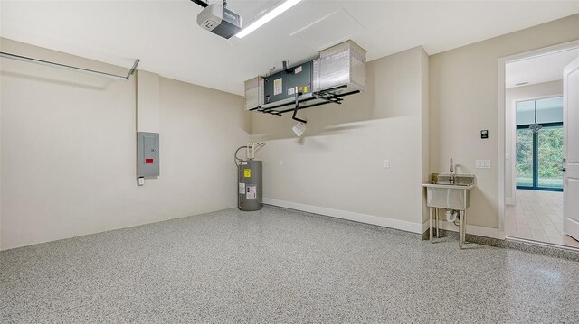 garage with a garage door opener, water heater, and electric panel