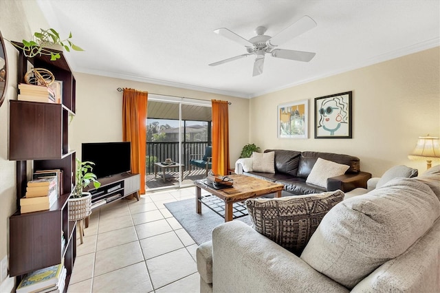 living room with ceiling fan, ornamental molding, and light tile patterned floors