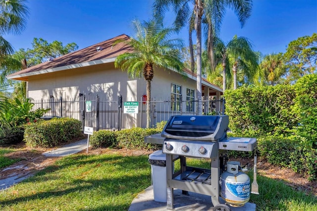 view of property exterior with a lawn