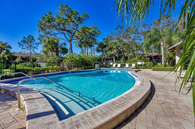 view of pool featuring a patio