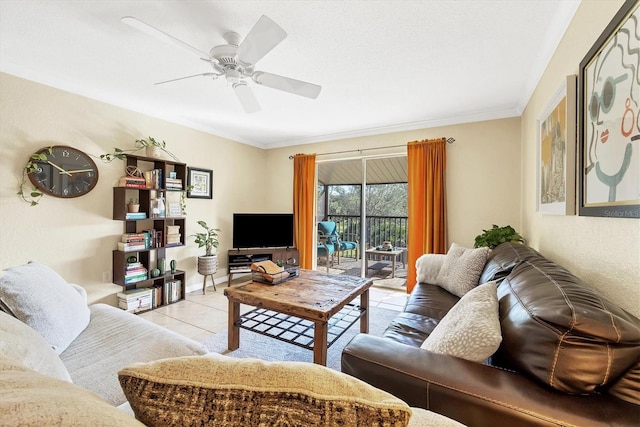 living room featuring ceiling fan, light tile patterned floors, and ornamental molding