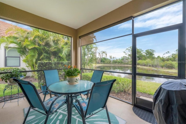 sunroom with a water view