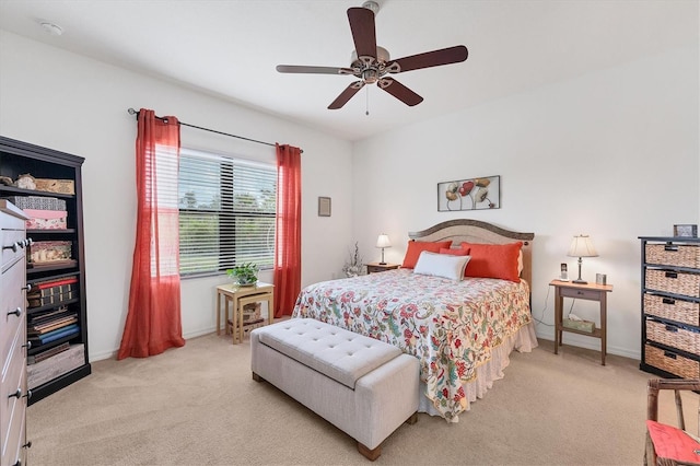 carpeted bedroom featuring ceiling fan