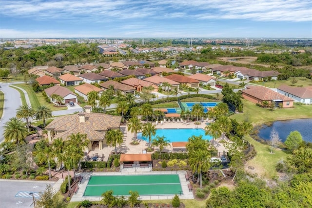 birds eye view of property featuring a water view