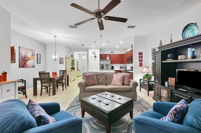 living area featuring a ceiling fan, recessed lighting, visible vents, and light tile patterned floors