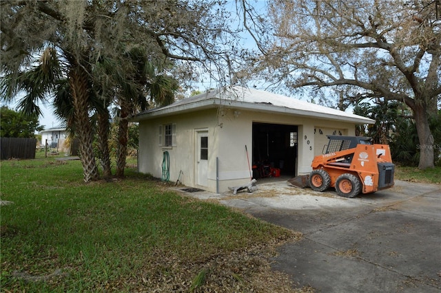 view of side of home featuring a yard