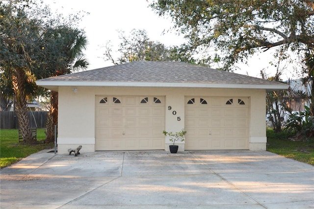 detached garage with fence