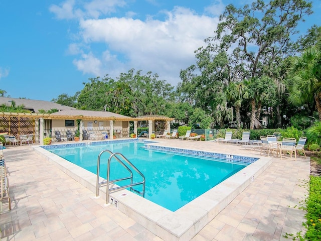 view of pool featuring a patio area