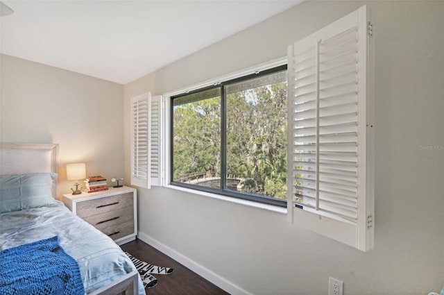 bedroom featuring dark hardwood / wood-style floors