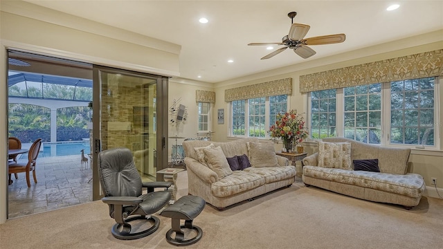 sunroom with ceiling fan