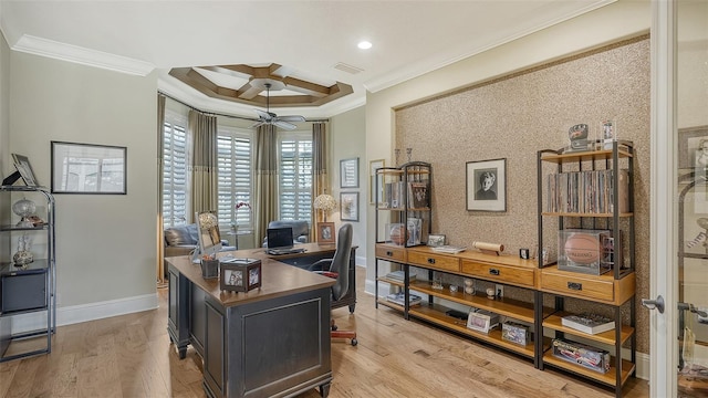 home office featuring ceiling fan, light wood-type flooring, and crown molding