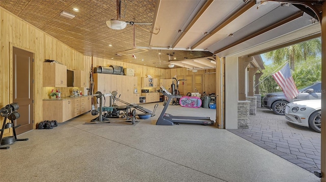 workout room with wooden walls